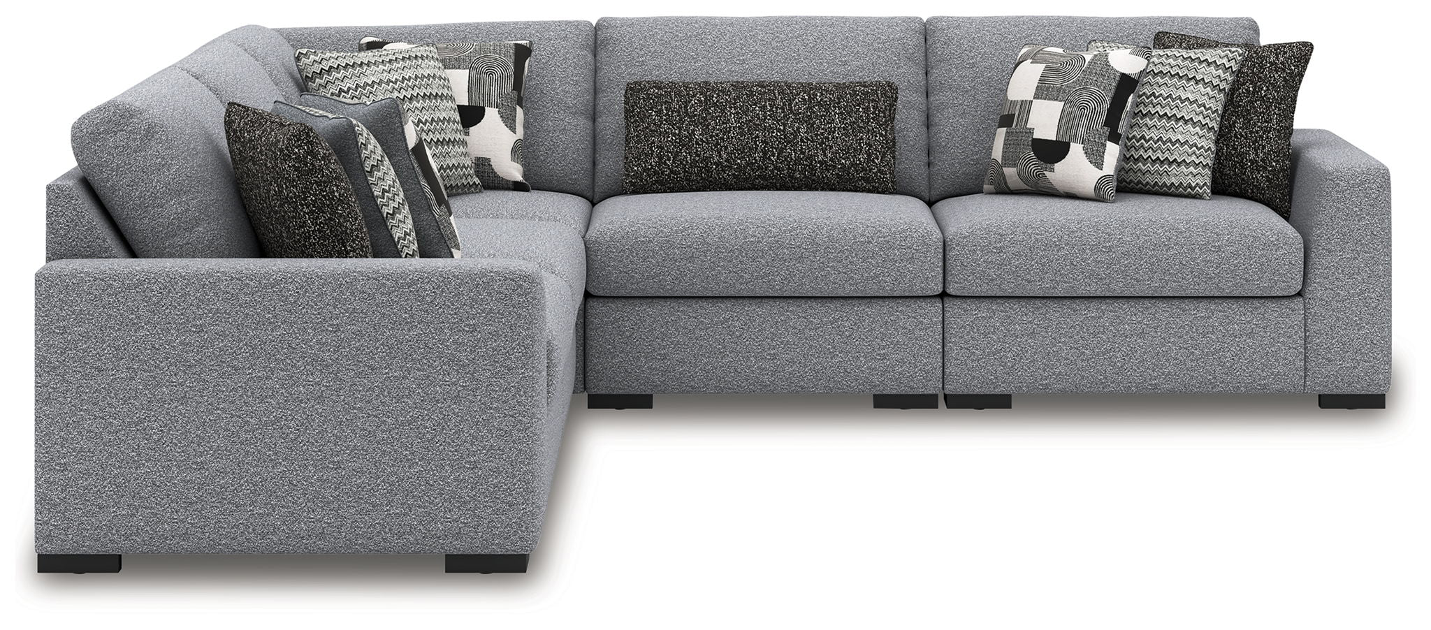 Gray sectional sofa with chaise seating and patterned throw pillows