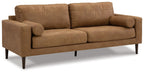 Caramel fabric sofa, angled view with round bolster arm details and tapered legs