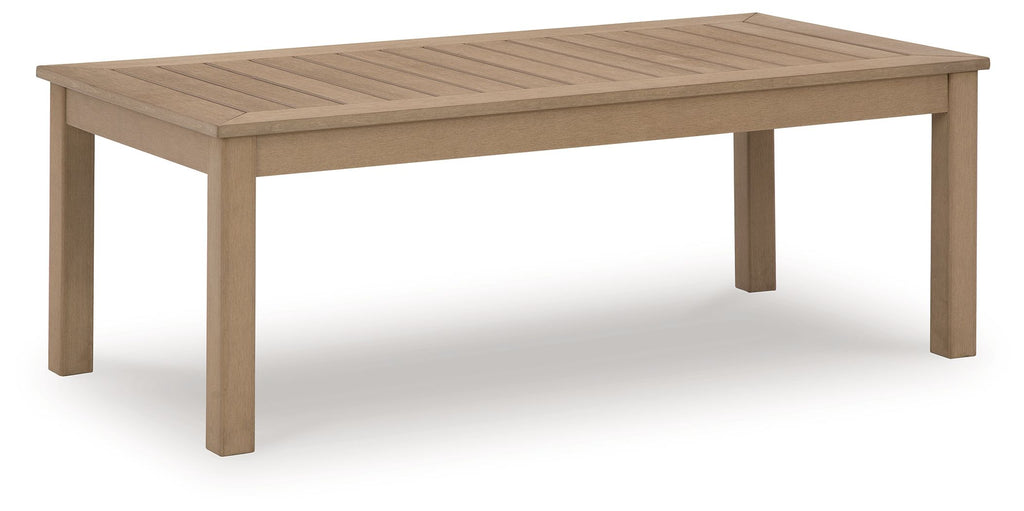 Rectangular driftwood cocktail table with slatted top and four straight legs.