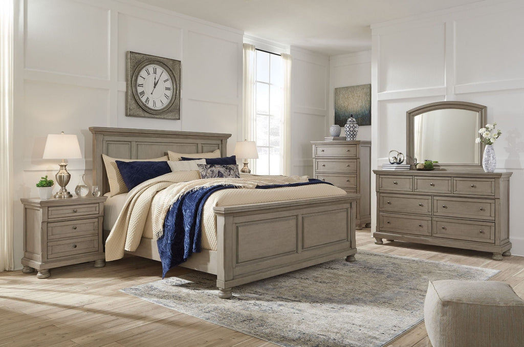 Light gray Lettner dresser with arched mirror and multiple drawers in a bedroom