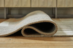 Abbotton rug rolled edge with textured short pile and woven border