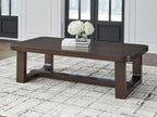Dark brown rectangular cocktail table with solid top and sturdy block legs