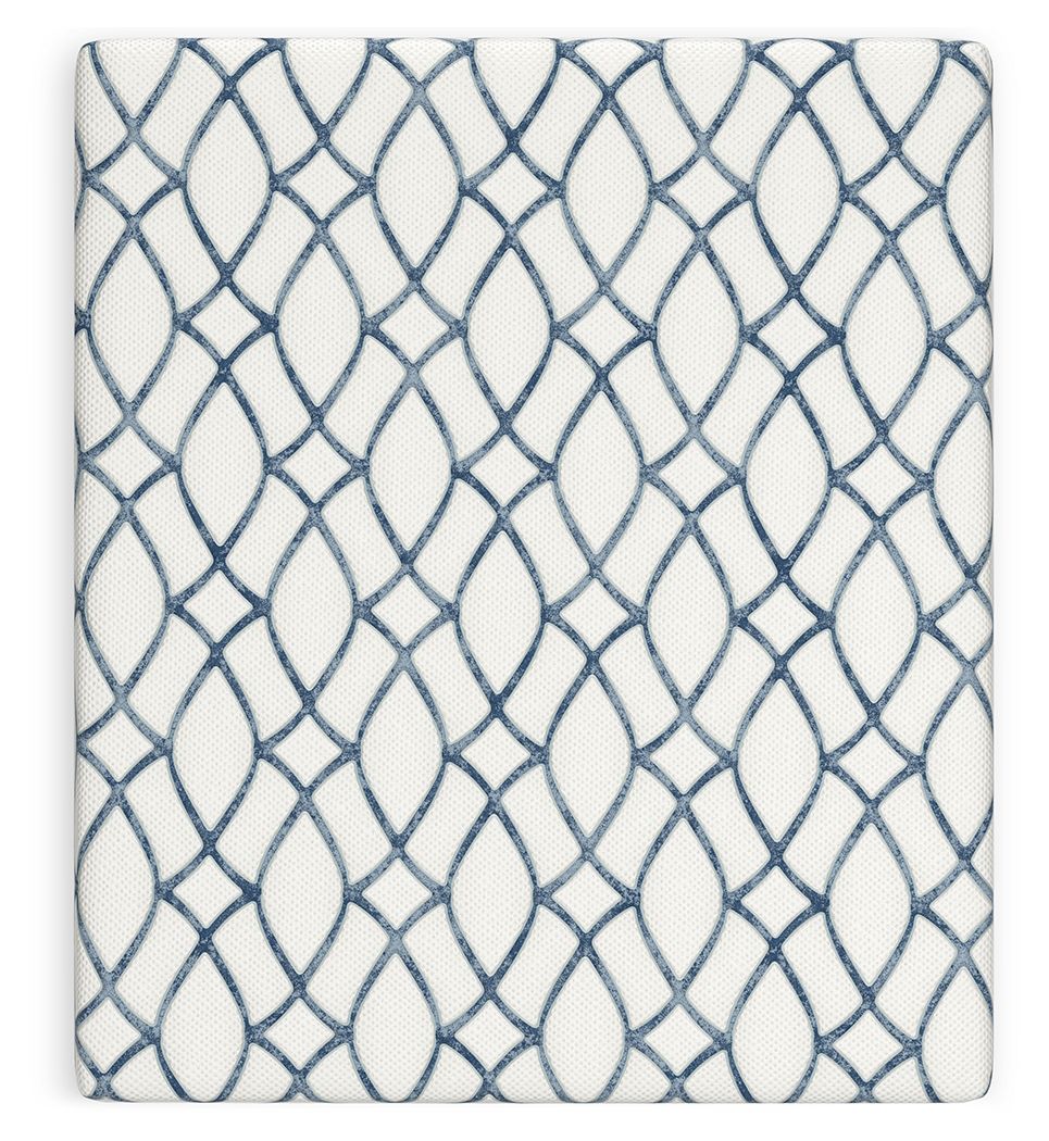 White mattress top with blue oval lattice pattern