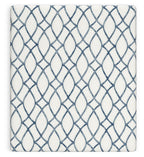 White mattress top with blue oval lattice pattern