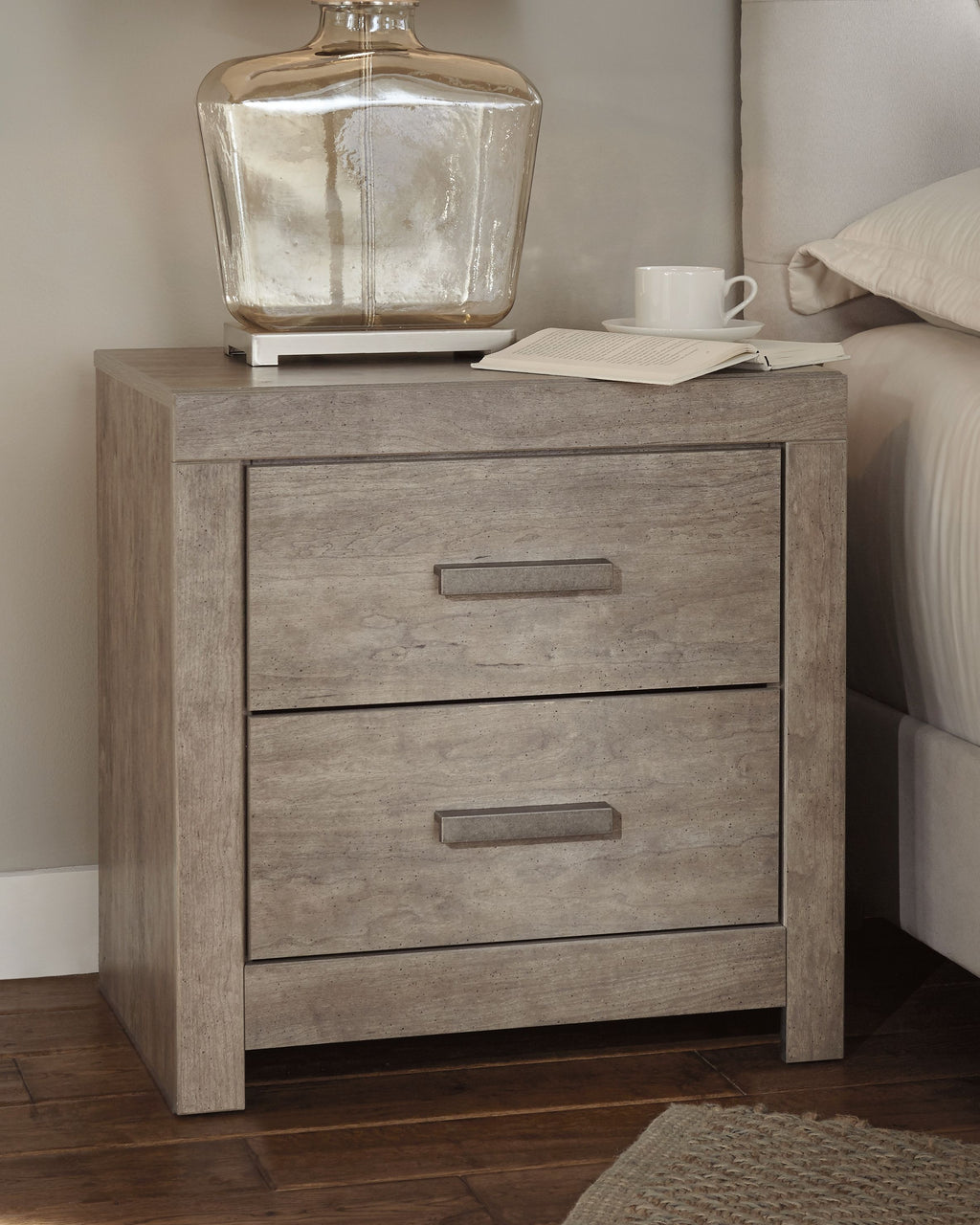 Gray two-drawer night stand with two drawers and rectangular bar handles
