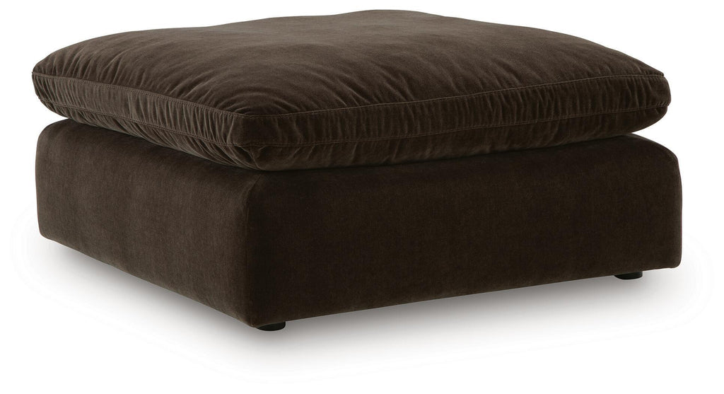 Oversized accent ottoman in dark brown, top cushion with stitched edge and legs