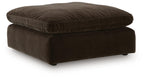 Oversized accent ottoman in dark brown, top cushion with stitched edge and legs