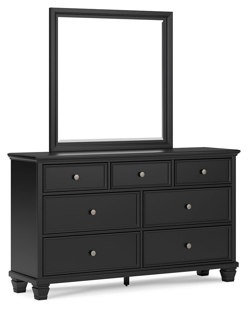 Black dresser with raised mirror and three rows of drawers, silver knobs, four legs