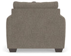 Beige fabric loveseat back with squared arms and clean upholstered sides