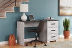 Home office desk with light gray wood-look body, dark top, three drawers, office chair