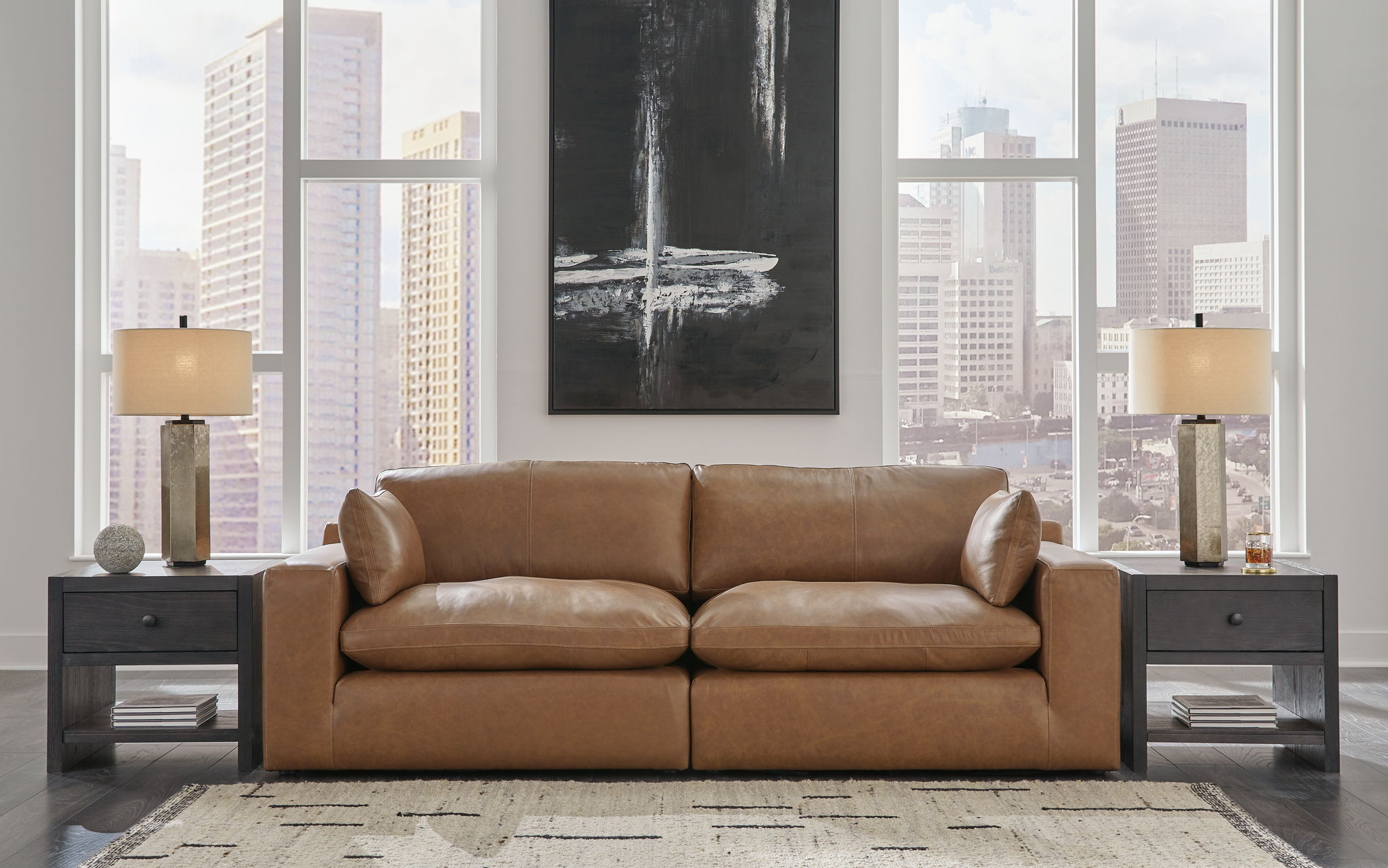 Caramel-brown sectional loveseat with chaise, rolled arms, and cushioned back