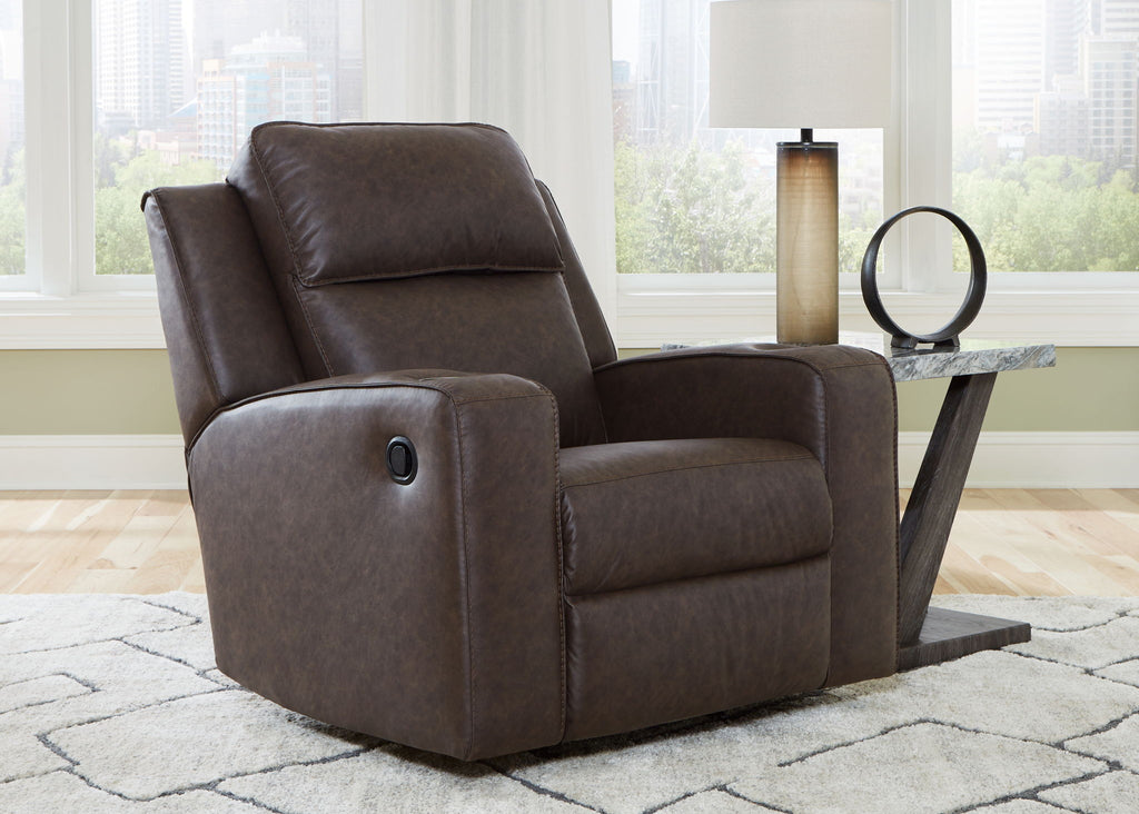 Dark gray fabric rocker recliner with high back and contoured seat
