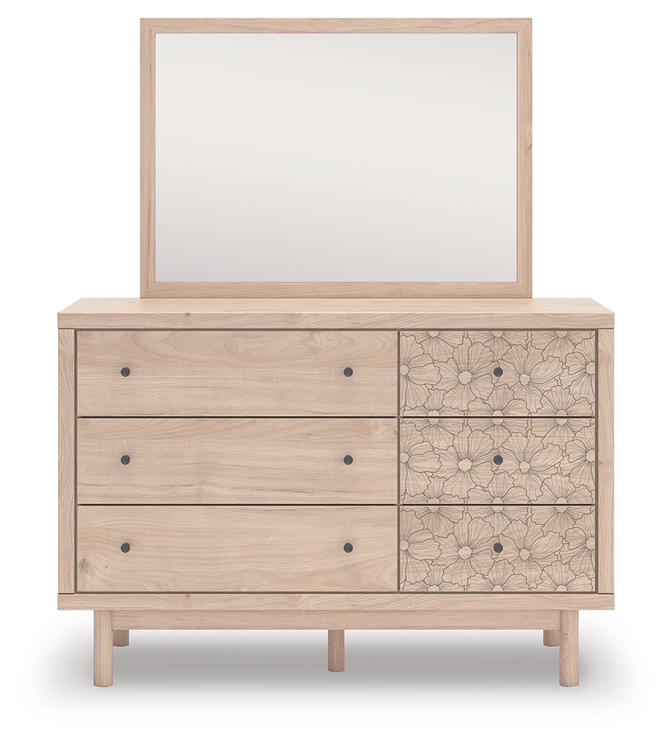 Tan wood dresser with mirror and floral-pattern drawers, six-drawer front