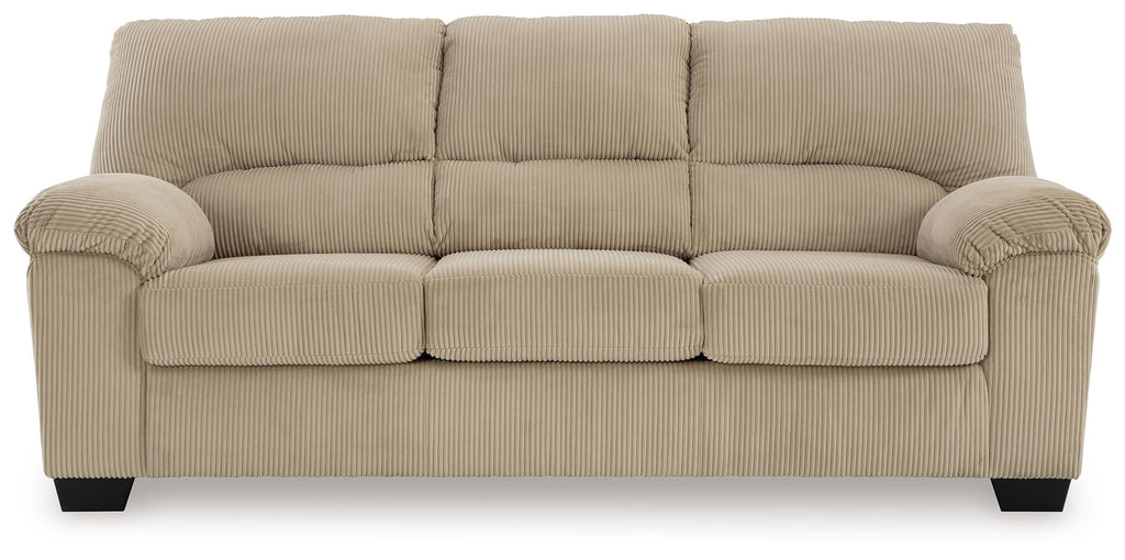 Sand ribbed sofa with rolled arms, three seat cushions and dark legs