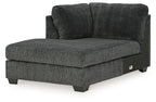 Dark gray fabric corner chaise with thick seat and rounded backrest