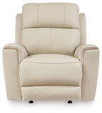 Light beige power rocker recliner with tall back and cushioned seat and arms