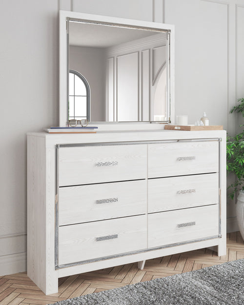White dresser with rectangular mirror and multiple drawers with metal bar handles