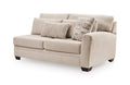 Light beige loveseat sofa with throw pillows