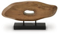 Light brown wood sculpture with oval cutout and central metal legs on black base