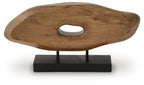 Light brown wood sculpture with oval cutout and central metal legs on black base