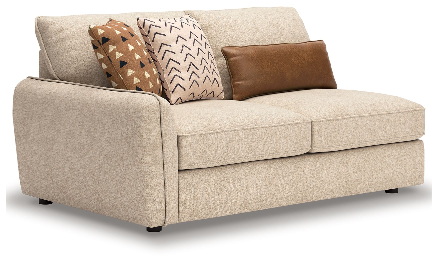 Sand LAF sofa with light beige upholstery, two-seat cushions, three patterned throw pillows.