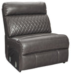 Gray armless chair with quilted backrest and padded seat, square arms and trim