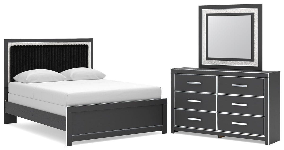 Upholstered panel bed frame in dark finish with white mattress and two pillows