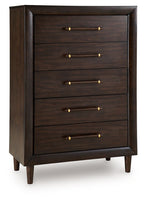 Five-drawer chest in dark wood with brass bar pulls and tapered legs