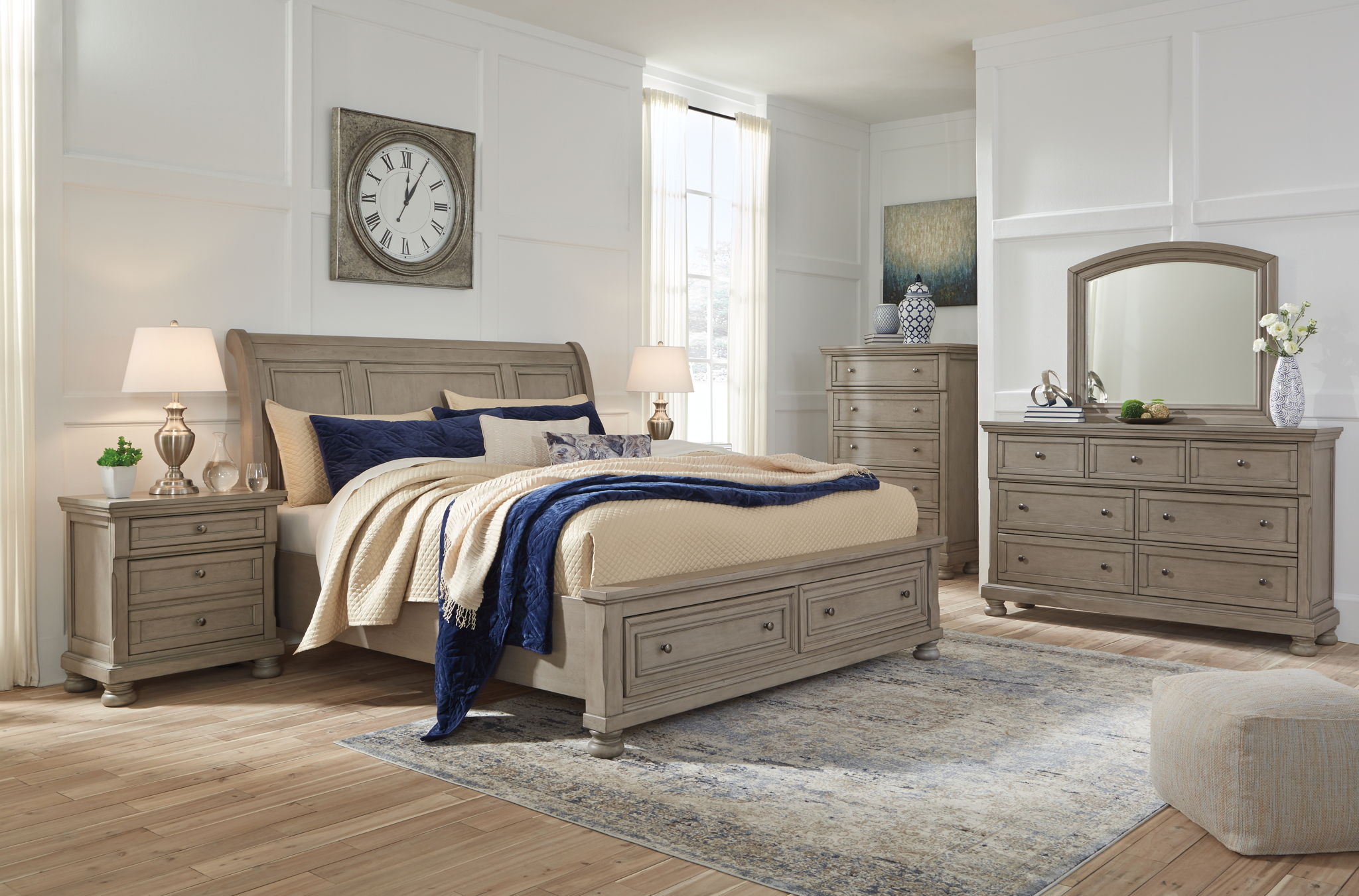 Gray dresser with arched mirror and multiple drawers, styled in bedroom setting