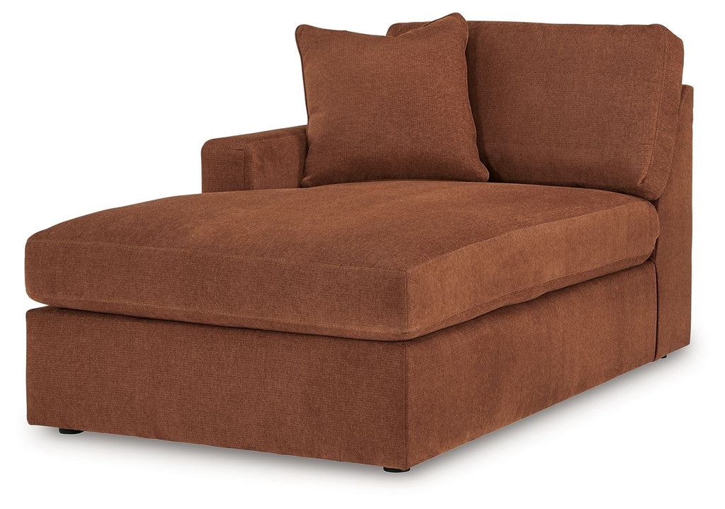 Spice brown corner chaise with rounded arms and two back pillows.