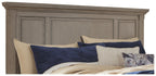 Gray panel headboard with recessed rectangular molding and tall top rail