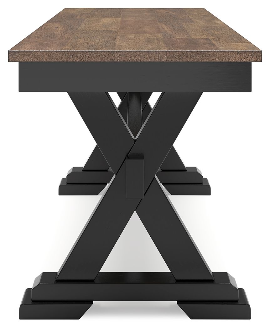 Dark brown dining bench with black pedestal base and wide feet.