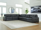 Corner sectional sofa with tufted back and seat cushions in dark upholstery
