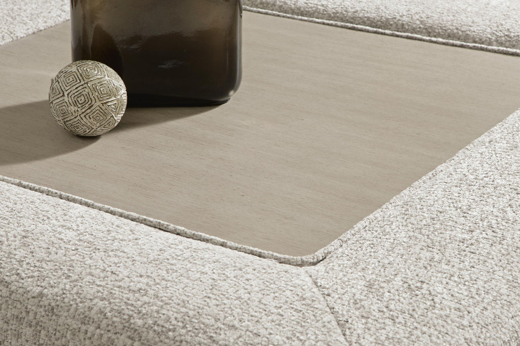 Oversized accent ottoman corner view, snowstone beige textured upholstery, open interior