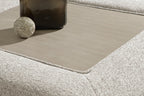 Oversized accent ottoman corner view, snowstone beige textured upholstery, open interior