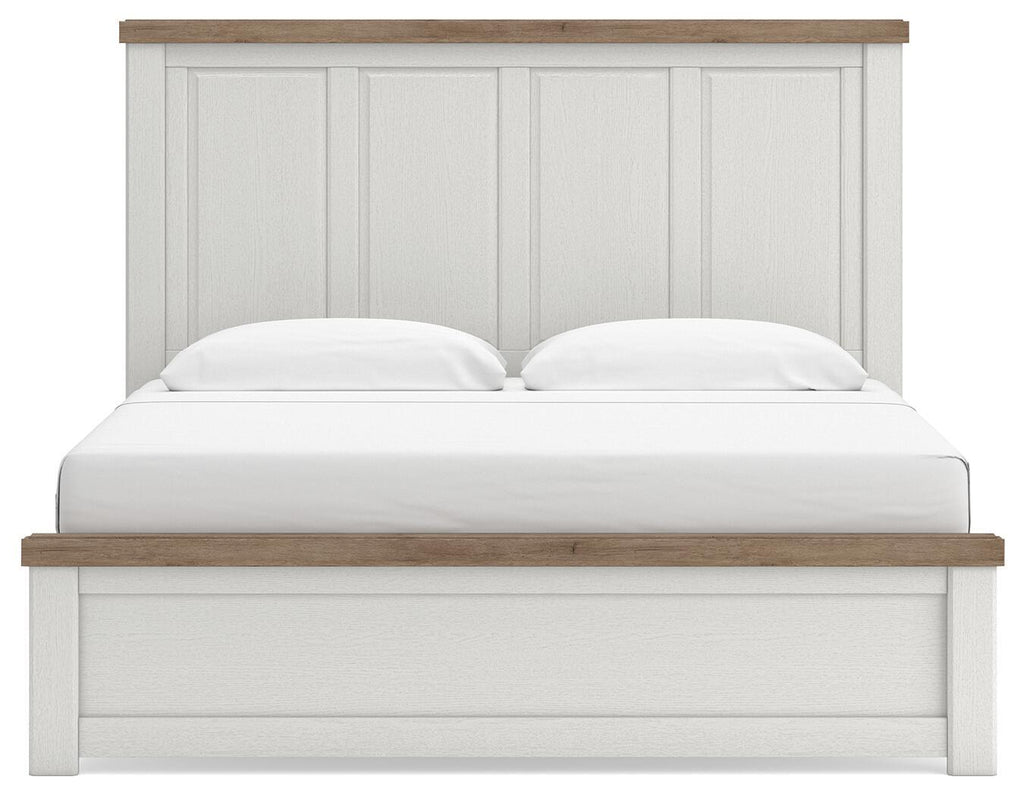 White panel bed with vertical paneled headboard, wood-tone top rails.