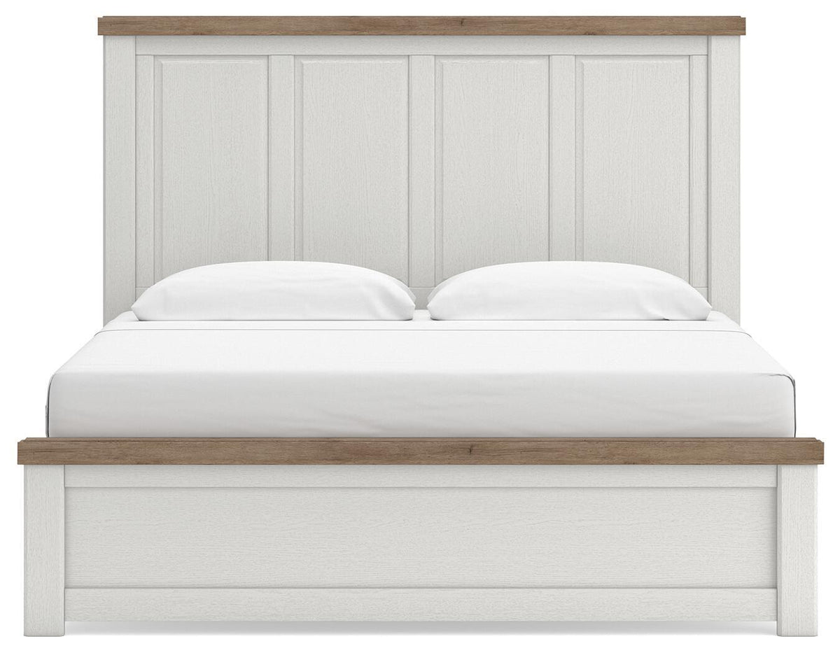White panel bed with vertical paneled headboard, wood-tone top rails.