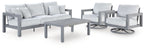 Gray outdoor sofa set with two lounge chairs and coffee table