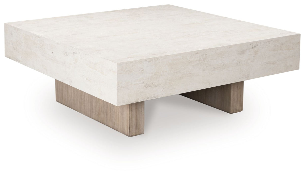 Jorlaina rectangular table with whitewashed top and chunky angled legs, light wood body