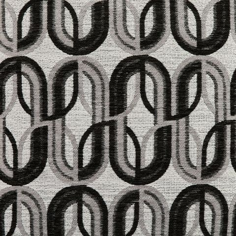 Patterned accent pillow fabric with repeating circular motif in black and gray