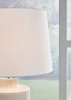 Off-white drum fabric lampshade on ceramic lamp base