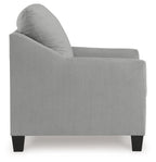 Upholstered armchair in light gray with rounded seat and back, visible side profile.