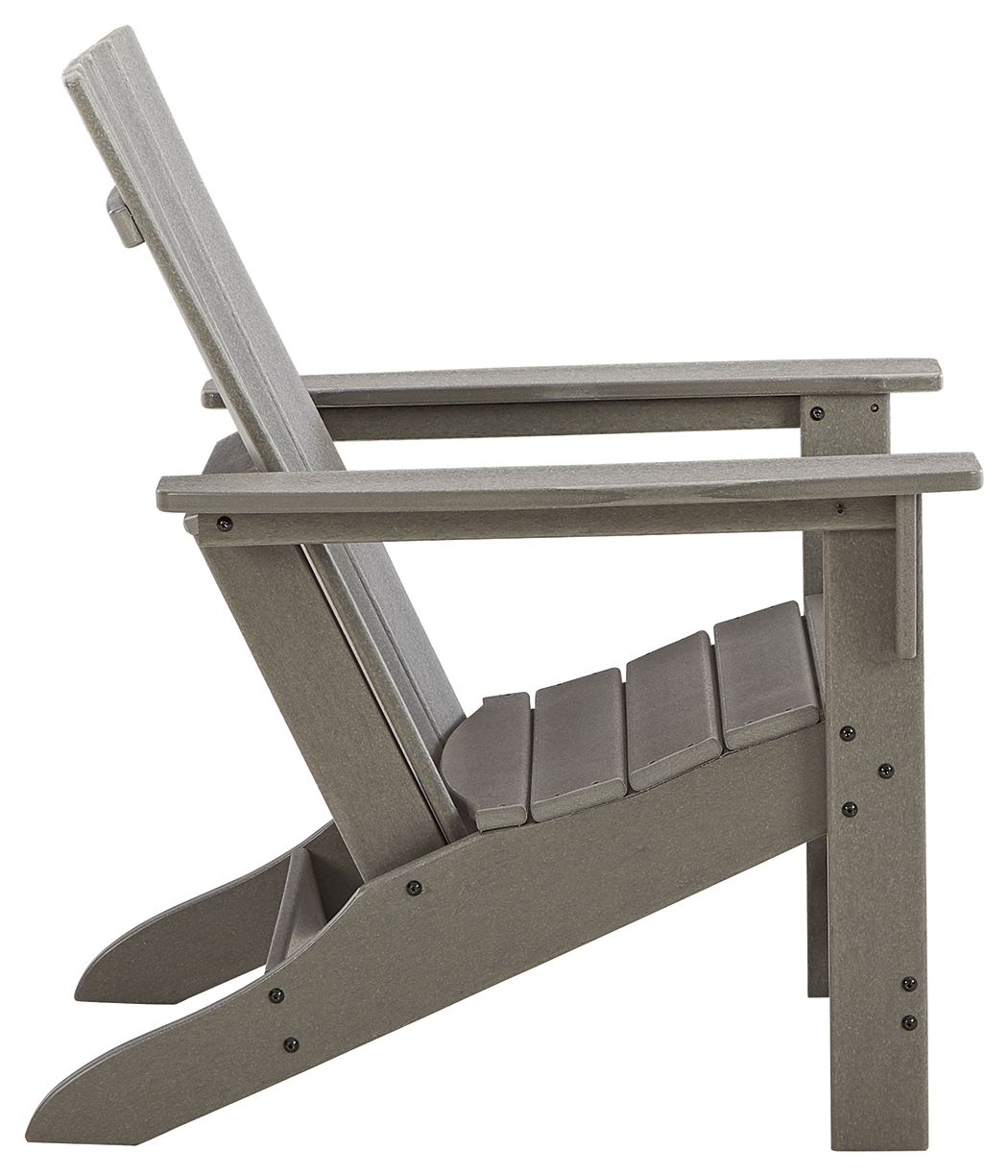 Gray Adirondack chair with slatted back and wide armrests, side view