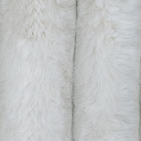 Off-white textured upholstery fabric swatch with vertical pile lines.