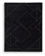 Black rug with white geometric line pattern and outlined diamond shapes