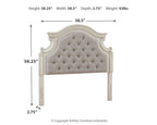 Upholstered headboard with arched top and tufted buttons, shown from the side