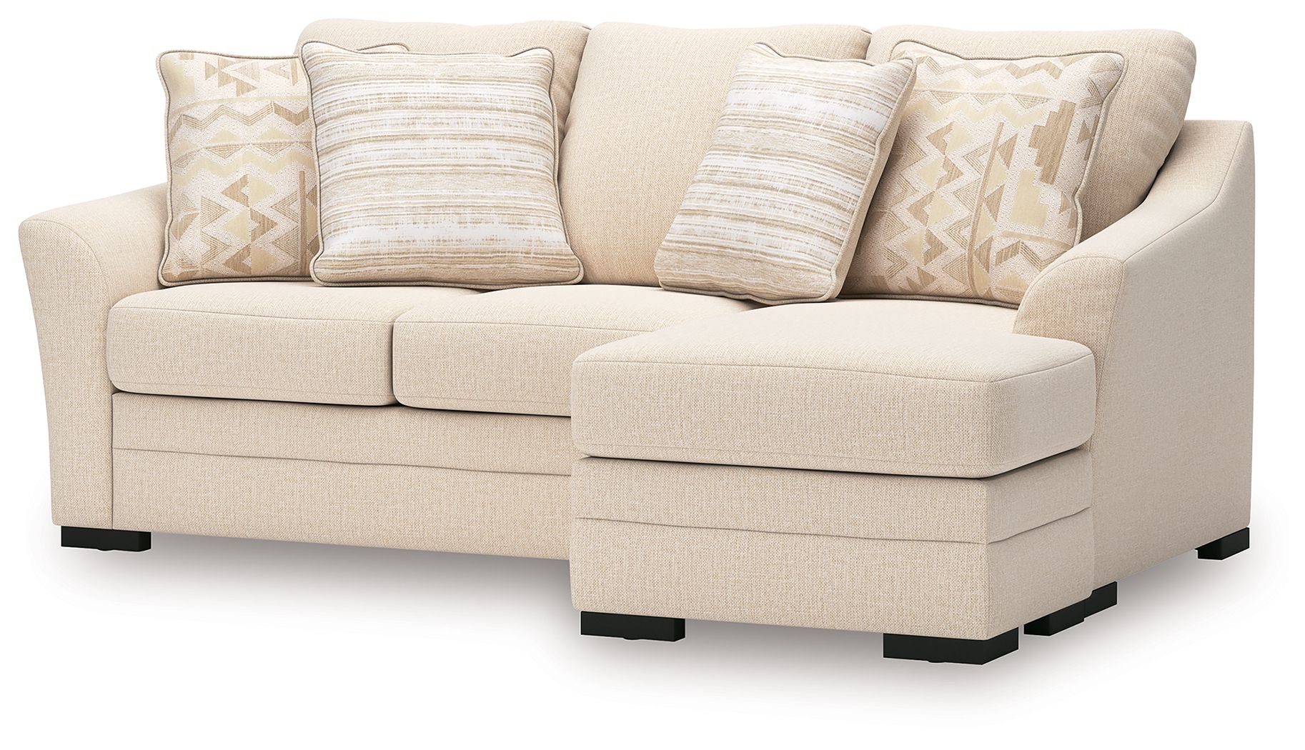 Queen sofa chaise sleeper with light beige chaise and armrests, patterned and striped pillows