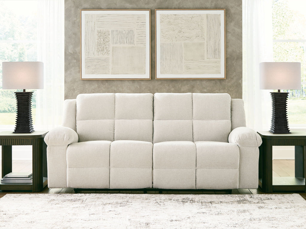 Cream 2-seat reclining sofa with tufted back cushions and round armrests