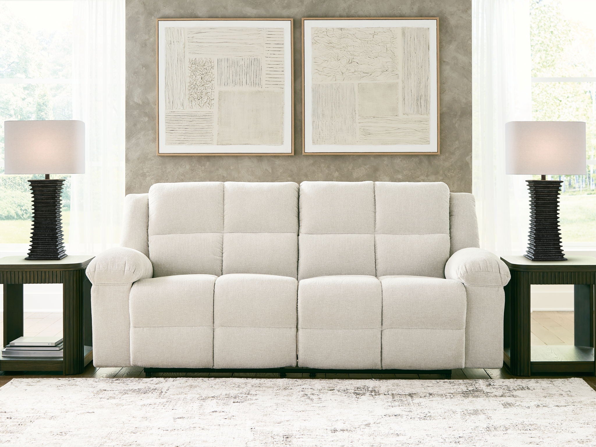 Cream 2-seat reclining sofa with tufted back cushions and round armrests