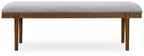 Large upholstered dining bench with gray padded top and brown wood base